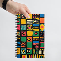 Context image of African-inspired ethnic pattern spiral notebook with the Tribal Tapestry artwork by Drese Art