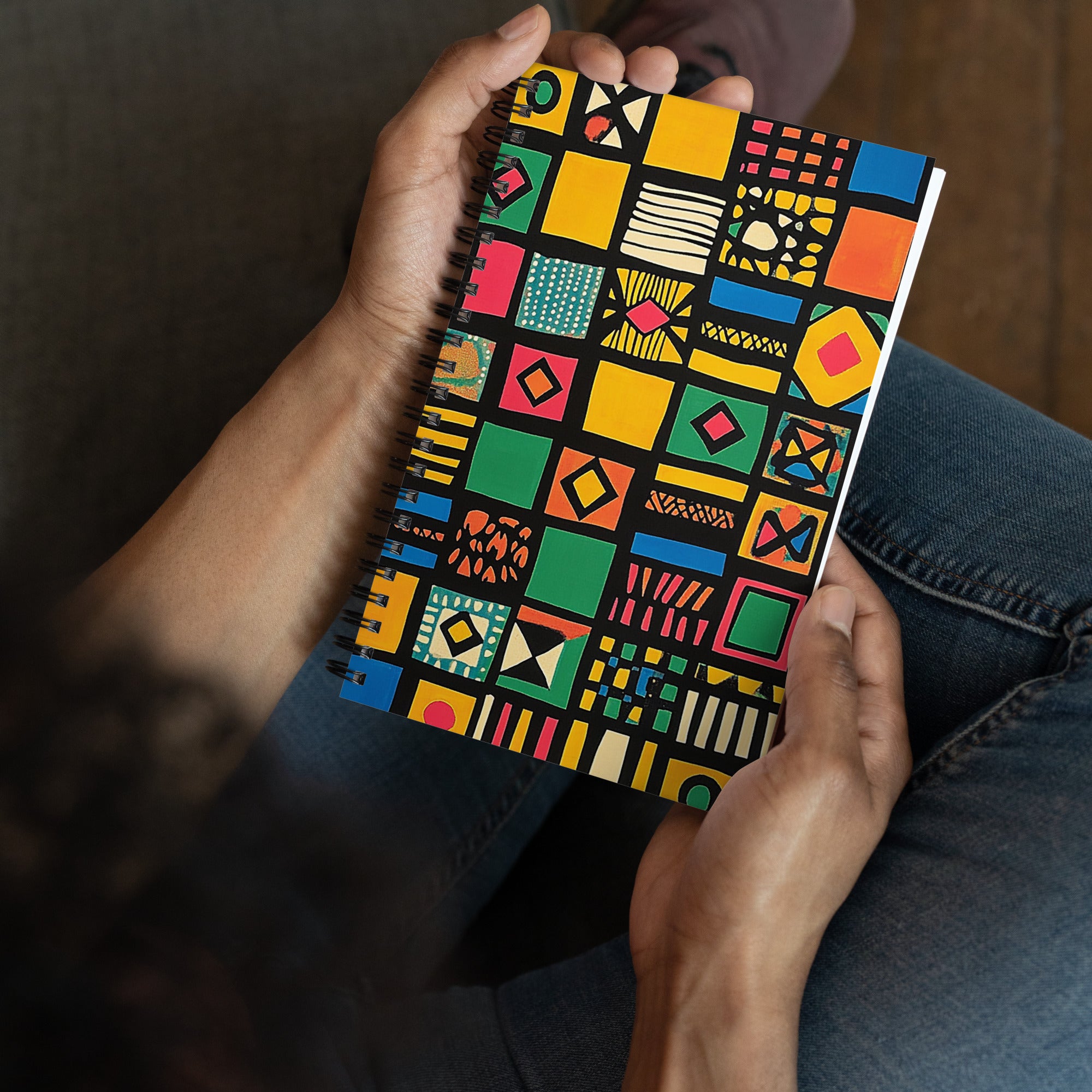 Context image of African-inspired ethnic pattern spiral notebook with the Tribal Tapestry artwork by Drese Art