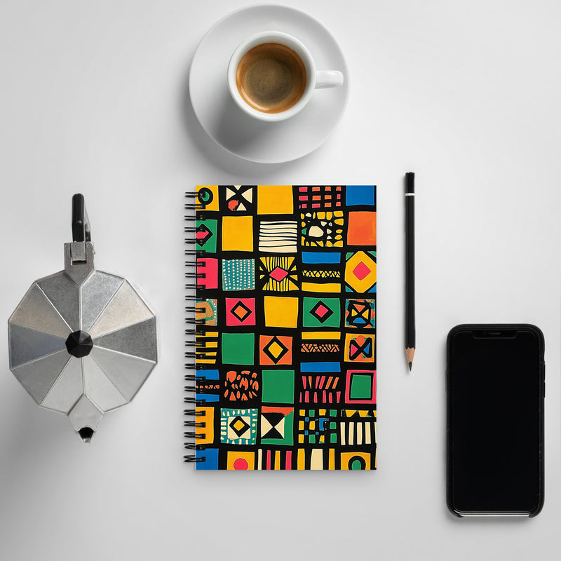Context image of African-inspired ethnic pattern spiral notebook with the Tribal Tapestry artwork by Drese Art