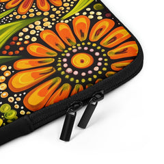 Closeup of laptop sleeve Flourishing Earth by Drese Art — earthy tones with cultural patterns