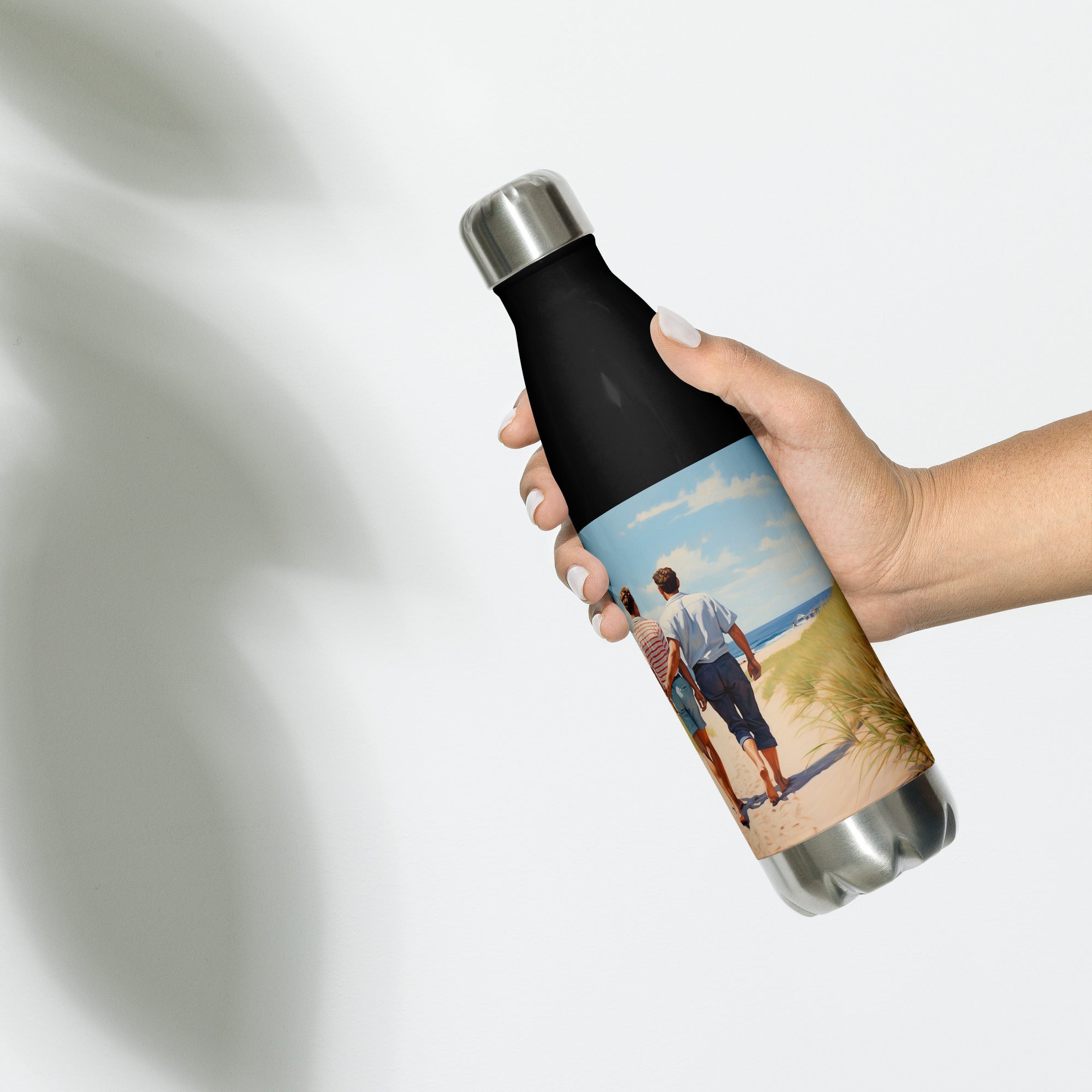 Context image of a Pride-inspired American vintage stainless steel water bottle with the Stroll by the Beach artwork by Drese